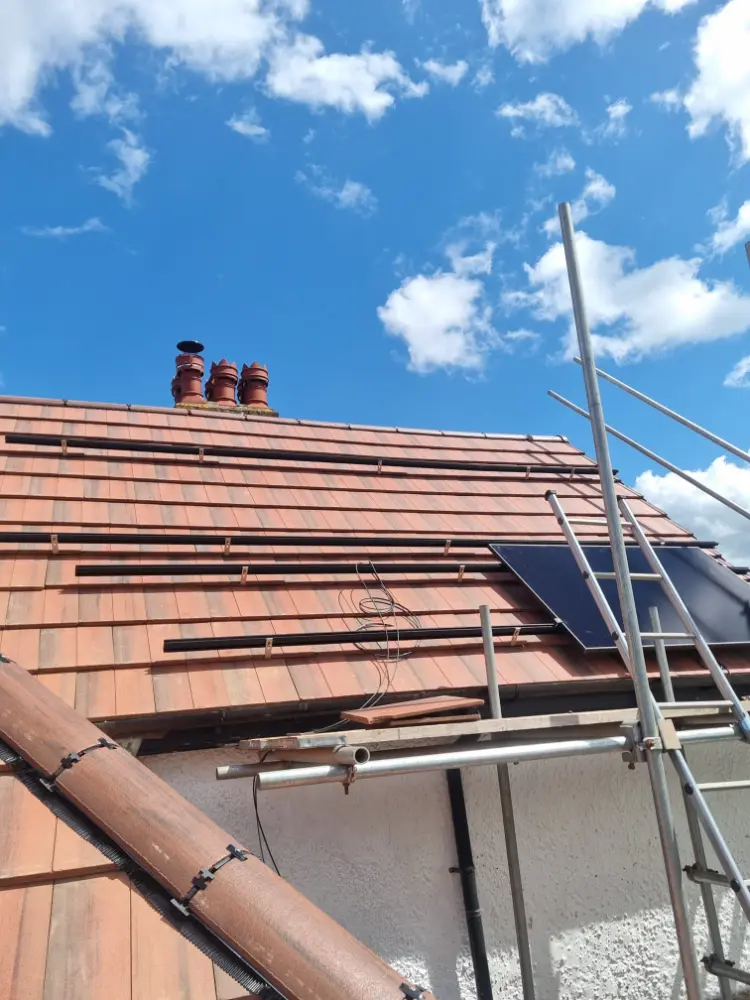 New Roof Installation with Solar Panels and Loft Conversion Works 1 roof solar conversion 01